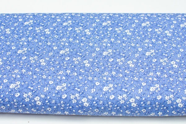 Łączka na jasnoniebieskim - tkanina bawełniana