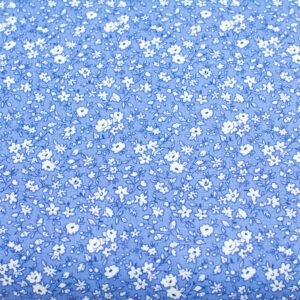 Łączka na jasnoniebieskim - tkanina bawełniana