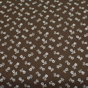 Kwiatuszek gwiazdka na brązowym - tkanina bawełniana