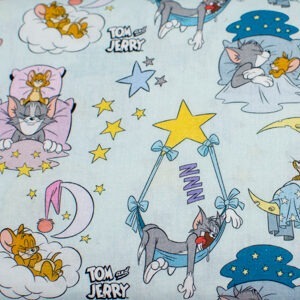 Tom i Jerry na niebieskim - tkanina bawełniana