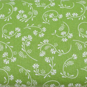 Białe zawijaski na zieleni - tkanina bawełniana