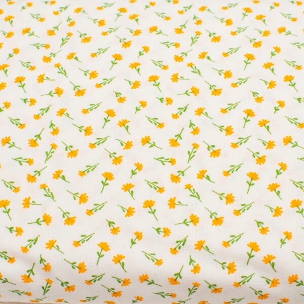 Drobne pomarańczowe kwiatuszki na bieli - tkanina bawełniana