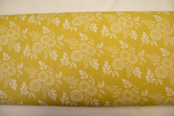Kwiaty rumianku na żółtym - tkanina bawełniana