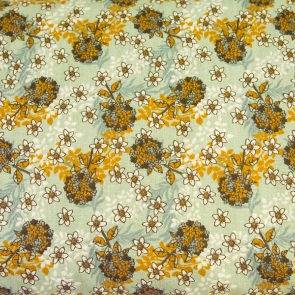 Ugrowe kwiaty na miętowym - tkanina bawełniana