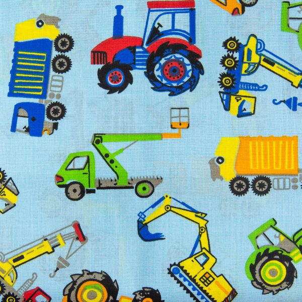 Traktory i ciężarówki na niebieskim - tkanina bawełniana