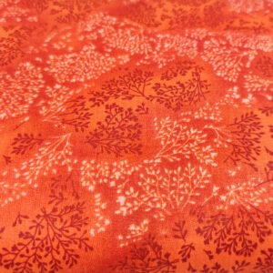Gałązki na pomarańczowym - tkanina bawełniana